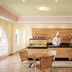 Mitsis Family Village Beach Hotel in Kardamena: bright café with pastry display and seating area