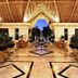 Bahia Principe Grand Coba lobby in Akumal with high thatched ceiling, chandeliers, and open-air view