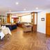 Hotel Döllnsee-Schorfheide in Templin: bright buffet dining room with herringbone wood floor and seating