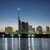 Hotel New Simple in Fukuoka skyline at dusk with waterfront reflections