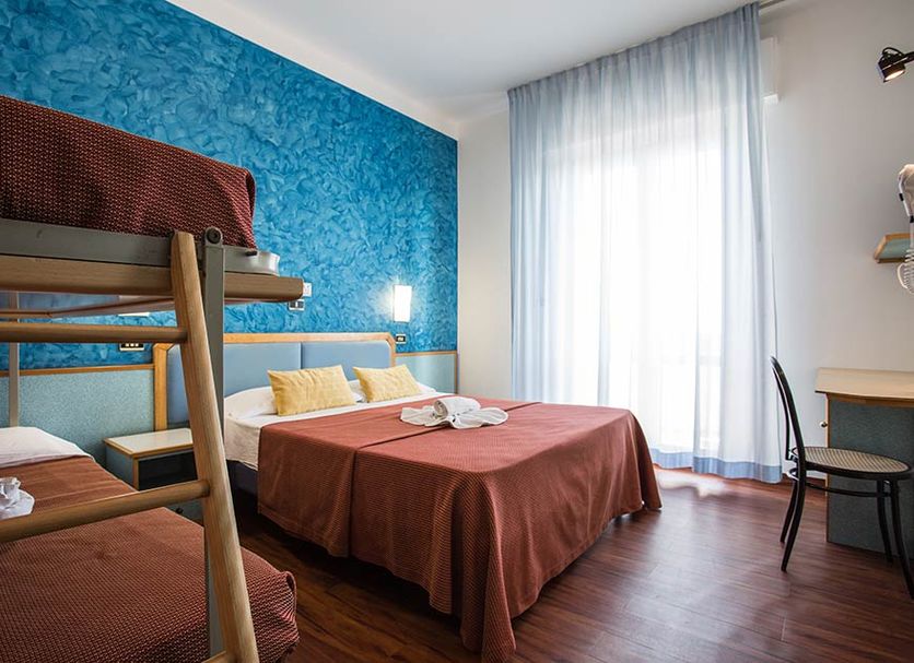 Hotel Due Mari & Spa in Rimini guest room with bunk bed, double bed and large window