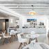 Mykonos Essence Adults Only breakfast buffet and seating area in bright Mykonos dining room