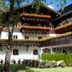 Valluga Hotel in Sankt Anton am Arlberg with flower-filled balconies and a landscaped courtyard