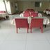 Hanting Express Kunshan Bailu Middle Road dining area in Suzhou with red chairs and white tablecloths