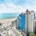 Sunset Hotel in Busan with oceanfront views, beach, and high-rise buildings along the coast