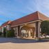 Laurel Inn & Conference Center in Salinas exterior with arched entrance and tiled roof