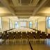 Garden Toscana Resort in San Vincenzo conference room with rows of chairs and long tables