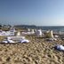 Garden Toscana Resort in San Vincenzo: beach lounge setup with cushions and sea view