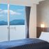 Global Resort Miyajima View Hiroshima room with balcony and sea view in Hatsukaichi