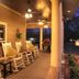 Porch seating at The Thornton Inn Bed and Breakfast in Arlington with rocking chairs and ceiling fans