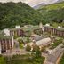 Osaek Greenyard Hotel in Yangyang, surrounded by lush mountains with a large courtyard and road