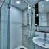 Provista Hotel Gangnam bathroom with glass shower and sink in Seoul