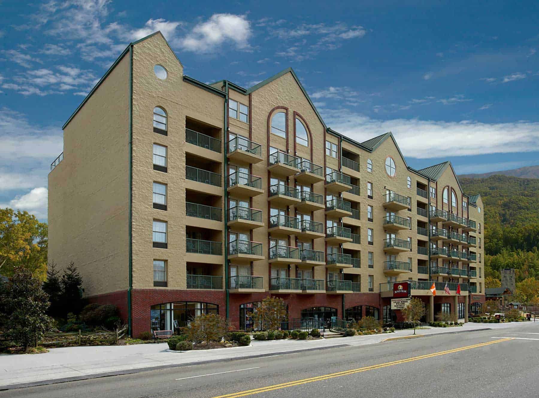 Black Bear Inn & Suites in Gatlinburg with balconies and mountain backdrop