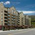 Black Bear Inn & Suites in Gatlinburg with balconies and mountain backdrop