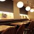 Mitsui Garden Hotel Osaka Yodoyabashi dining area in Osaka with booth seating and hanging round lights