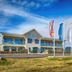 Stracta Hotel in Hella exterior with flags and blue sky