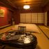 Yamanoo in Kanazawa: traditional tatami room with low table, floor cushions, and shoji screens