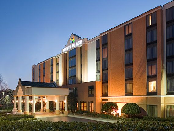 Hyatt Place Columbus Worthington exterior at dusk with lit entrance and multi-story facade in Columbus