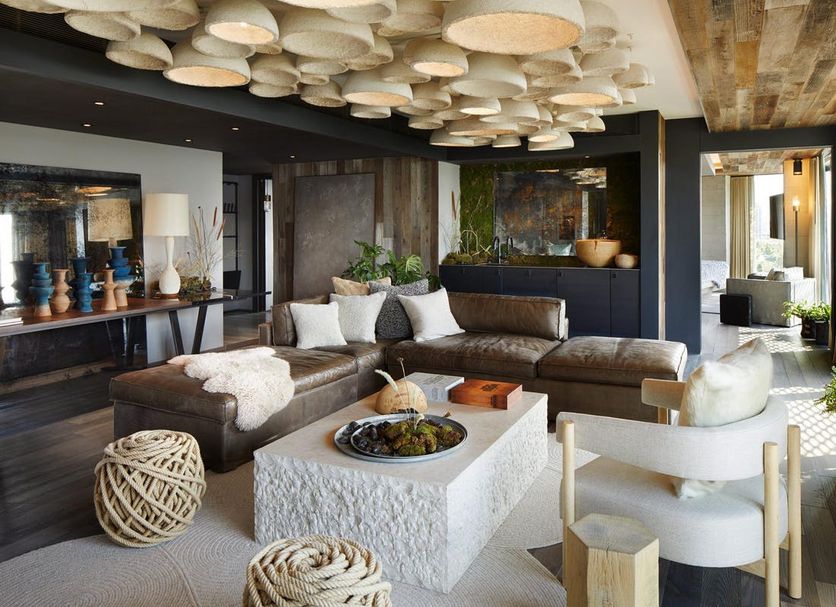 1 Hotel Brooklyn Bridge lounge with sectional seating, sculptural ceiling and city views in Brooklyn