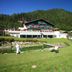 Alpenhotel Neuwirt in Schladming with alpine lodge balconies and mountain backdrop