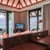 Heritance Aarah villa interior with ocean view, balcony seating, and large windows in Meedhoo