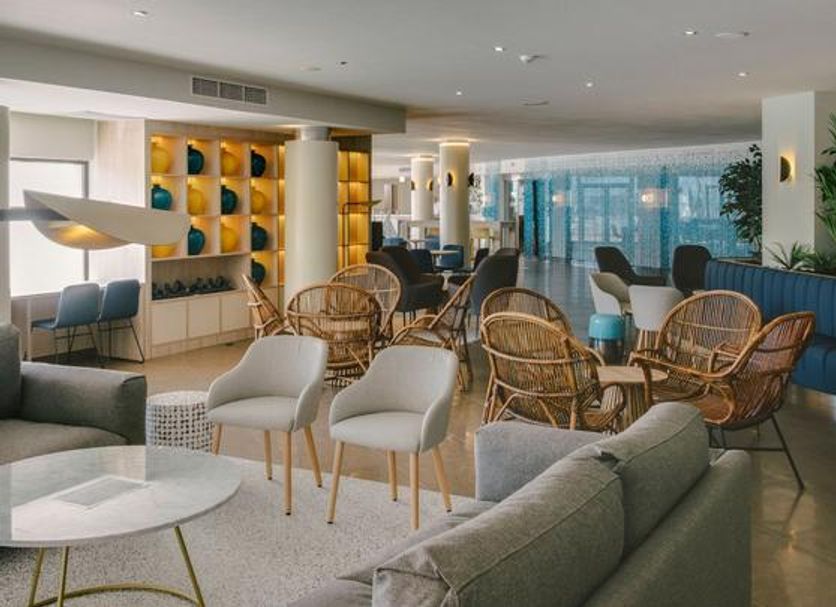Aluasoul Palma Hotel Adults Only lobby lounge in Palma de Mallorca with wicker chairs and seating area
