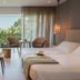 Nissi Beach Resort in Ayia Napa room with balcony view, twin beds, and seating area