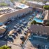 Aerial view of Hyannis Plaza Hotel in Hyannis with parking lot, buildings, and surrounding streets