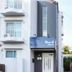 Stay Airport in Fukuoka exterior with balconies and a blue patio umbrella